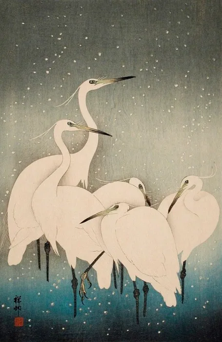 雪の中にたたずむ白鷺を描いた版画