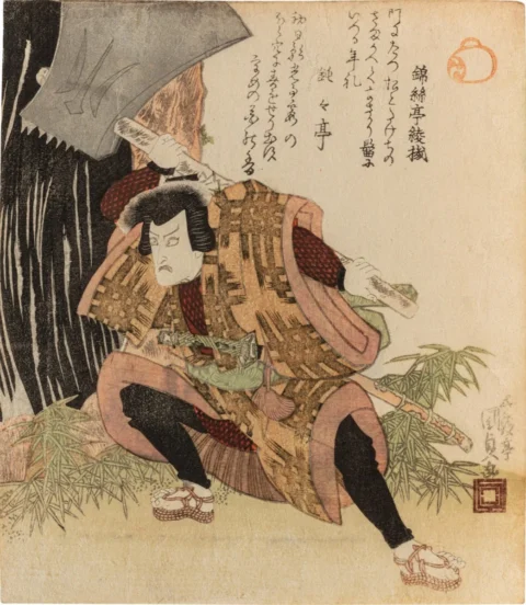 大きな斧を肩に担ぎ、腰を落として睨む歌舞伎役者を描いた浮世絵